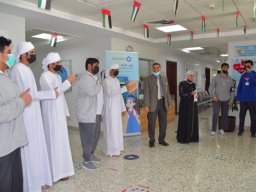 GR-12-Boys giving donation at Sharjah City for HumanitarianServices